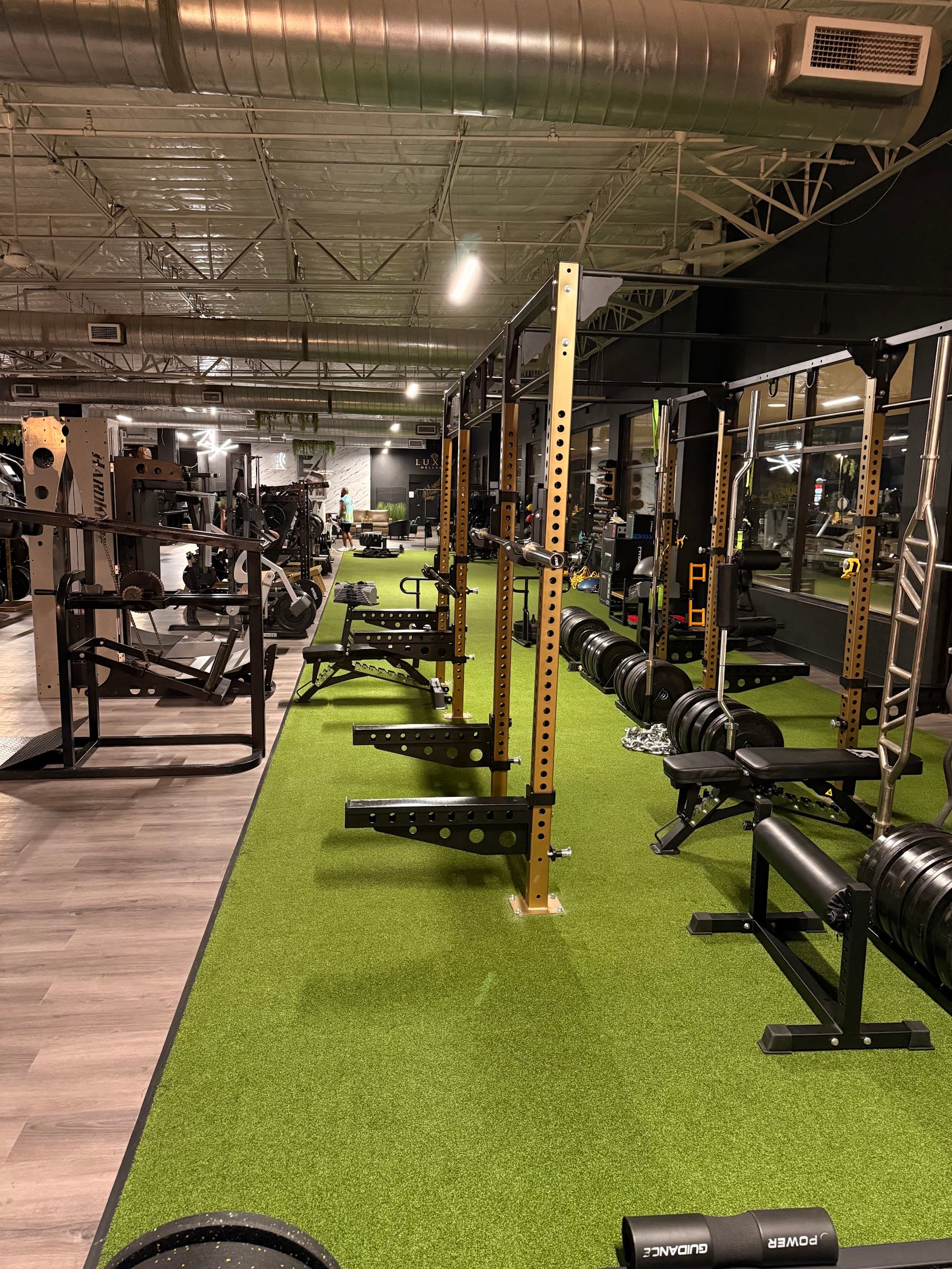 Power racks along the turf lane